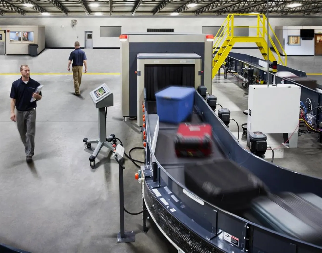 Checkpoint baggage screening system
